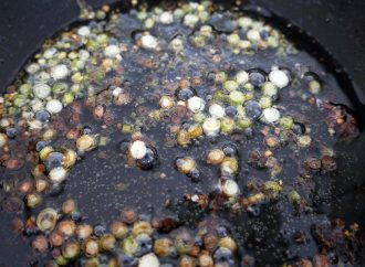 chopped scallions cooking in oil