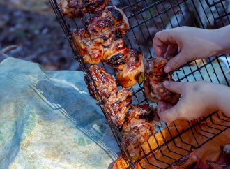 Jerk chicken being prepared for the grill.