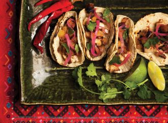 Chicken tacos al pastor on a plate.